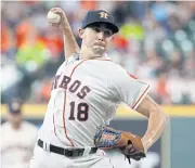  ?? AFP ?? The Astros’ Aaron Sanchez pitches in the first inning against the Mariners.