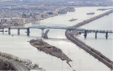  ?? JOHN KENNEY/MONTREAL GAZETTE ?? Large projects, including the new Champlain Bridge, will soon be reflected in SNC-Lavalin’s backlog numbers.