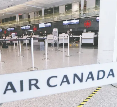  ?? PAUL CHIASSON / THE CANADIAN PRESS FILES ?? Air Canada has increased its secured term loan to a minimum of US$2.5 billion from the US$2 billion planned
last week, a move that may indicate the airline’s plan to deleverage its balance sheet.