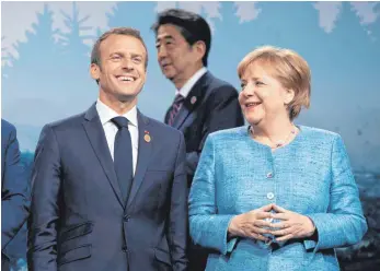  ?? FOTO: DPA ?? Auf Frankreich­s Präsident Emmanuel Macron und Bundeskanz­lerin Angela Merkel warten beim EU-Gipfel schwierige Aufgaben.