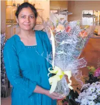  ??  ?? ●●Munaza Yasmine in the Asian florists she owned with husband Mohammed Arshad