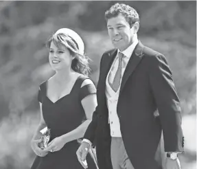  ?? JUSTIN TALLIS/AFP/GETTY IMAGES ?? Princess Eugenie of York and fiance Jack Brooksbank attended the 2017 wedding of Pippa Middleton and James Matthews.