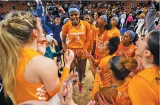  ?? AP PHOTO/MIC SMITH ?? Tennessee players, including Rickea Jackson (2) and Jordan Horston (25), celebrate after the Lady Vols beat LSU in an SEC tournament semifinal on March 4 in Greenville, S.C.
