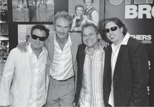  ?? STEPHEN SHUGERMAN TNS ?? Musician Pablo Cruise, second from left, and band members attend the premiere of Sony Pictures' "Step Brothers" at the Mann Village Theater on July 15, 2008, in Westwood, California.