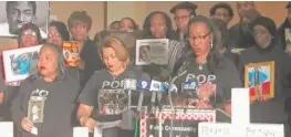  ?? | RACHEL HINTON/ SUN- TIMES ?? PamBosley, at the podium, speaks at a press conference for parents of victims of gun violence on Sunday.