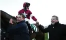  ??  ?? Rob James after a win for trainer Gordon Elliott (right) at Cheltenham last March. Photograph: Tim Goode/PA