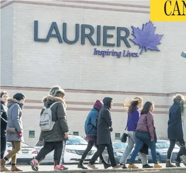  ?? TYLER ANDERSON / NATIONAL POST ?? Wilfred Laurier University announced last May that all female faculty members would receive a pay increase. Questions have been raised about the methodolog­y that the joint university/faculty committee used to find evidence of systemic wage...