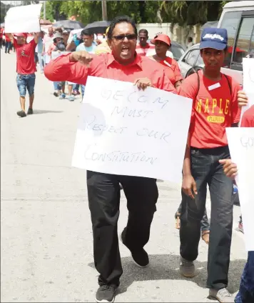  ??  ?? A protestor calling for GECOM to respect the Constituti­on. (Photo by Terrence Thompson)