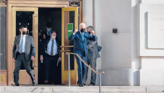  ?? SARABETH MANEY/THE NEW YORK TIMES ?? President Joe Biden gestures as he departs Walter Reed National Military Medical Center in Bethesda, Maryland, on Nov. 19 after a routine physical exam.