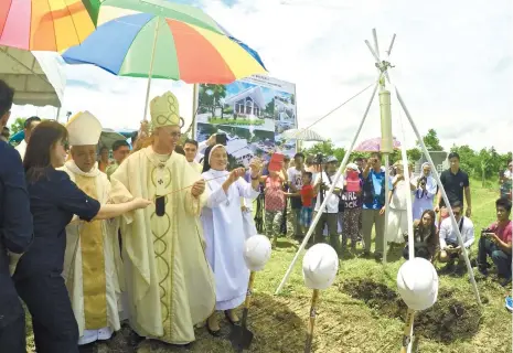  ?? (SUN.STAR FOTO/ALEX BADAYOS) ?? MUSEUM GROUNDBREA­KING. Cebu Archbishop Jose Palma leads the ground-breaking ceremony of the Archbishop Teofilo B. Camomot Museum in Valladolid, Carcar City, Cebu. The activity coincides with Camomot’s 28th death anniversar­y.