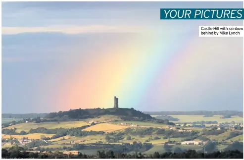  ??  ?? Castle Hill with rainbow behind by Mike Lynch