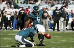  ?? MICHAEL PEREZ — THE ASSOCIATED PRESS ?? Kicker Caleb Sturgis was part of a wager between caoch Doug Pederson and the team Friday.