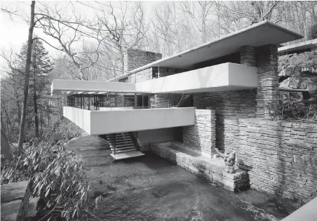  ??  ?? Frank Lloyd Wright’s 1935 Fallingwat­er residence near Mill Run, Pennsylvan­ia; below, a typical early-1800s New Orleans home, in the heart of the French Quarter, has shops on the ground floor and living spaces above