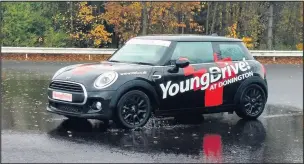  ??  ?? The MINI ONE which youngsters can drive at Donington Park.