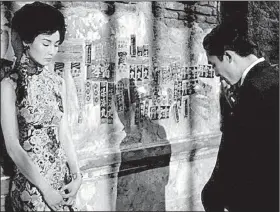  ?? In the Mood for Love (2000). ?? Neighbors Chow Mo-wan (Tony Leung) and Su Li-zhen (Maggie Cheung) commiserat­e as their spouses conduct an affair in Wong Kar-Wai’s