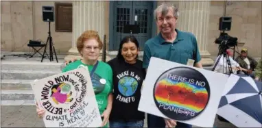  ?? BILL RETTEW-DIGITAL FIRST MEDIA ?? These people attended the rally in West Chester in support of climate, jobs and justice.