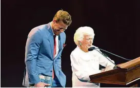  ?? David Shutts ?? J.J. Watt and Barbara Bush ham it up onstage.