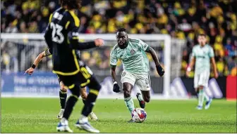  ?? COURTESY ?? Atlanta United midfielder Tristan Muyumba dribbles against Columbus in Game 3 of their playoff series in November. The Crew won at home to clinch the series and went on to capture the MLS Cup.