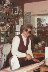  ?? ?? ABOVE RIGHT: Liz’s mother Pat ironing in the farmhouse kitchen.