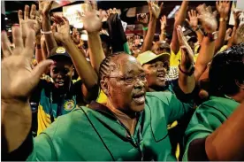  ?? THEMBA HADEBE / ASSOCIATED PRESS ?? Delegates gesture as they wait for the delayed start of the ruling African National Congress elective conference in Johannesbu­rg on Saturday. Observers say the party needs to restore its reputation.