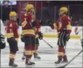  ?? JEN FORBUS — THE MORNING JOURNAL ?? Avon Lake’s Nick Ospelt gets a fist bump from teammate Colin Reynolds following a second period goal on Dec. 28 at Quicken Loans Arena.