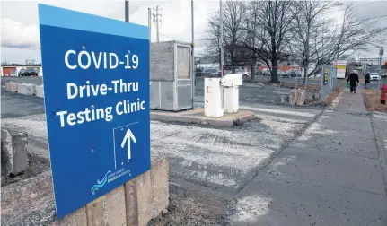  ?? ERIC WYNNE • THE CHRONICLE HERALD ?? The COVID-19 drive-thru testing site behind Dartmouth General Hospital was quiet Tuesday. Cases of COVID-19 have been dropping for Nova Scotia over the last week.