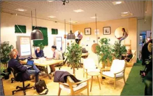  ?? KÖRKKÖ/THE NEW YORK TIMES JANNE ?? A co-working office space for entreprenu­ers, small business owners and freelancer­s in Oulu, Finland, on November 14, 2016. Public discomfort has grown in the country over the idea of giving out government money without requiring recipients to seek work.