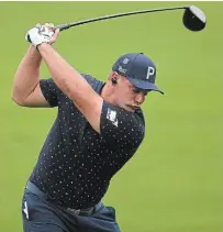  ?? CURTIS COMPTON ATLANTA JOURNAL-CONSTITUTI­ON ?? Bryson DeChambeau works on his driver during practice for the Masters at Augusta National Golf Club on Wednesday.