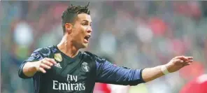  ?? MICHAEL DALDER / REUTERS ?? Cristiano Ronaldo celebrates scoring Real Madrid’s second goal against Bayern Munich in their Champions League quarterfin­al first-leg match at Allianz Arena, Munich on Wednesday.