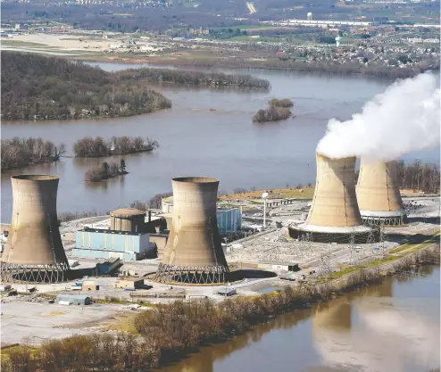  ?? Richard Hertzler / LNP / Lancastero­nline via the asociat ed press files ?? An aerial view of Three Mile Island in 2018, one year prior to the surviving power unit there being shut down.
