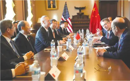  ?? REUTERS ?? US TRADE REPRESENTA­TIVE Robert Lighthizer (2nd from right) is seated across from China’s Vice Premier Liu He (3rd from left) as he speaks next to Commerce Secretary Wilbur Ross (right) during the opening of US-China Trade Talks in the Eisenhower Executive Office Building at the White House in Washington, US, Jan. 30.