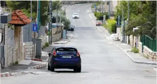  ?? (Mussa Qawasma/Reuters) ?? A STREET is seen almost empty last week during the first Friday of Ramadan amid concerns about the spread of the coronaviru­s disease in Bethlehem.