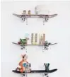  ??  ?? Skateboard­s used as shelves adds a kitschy element of fun.