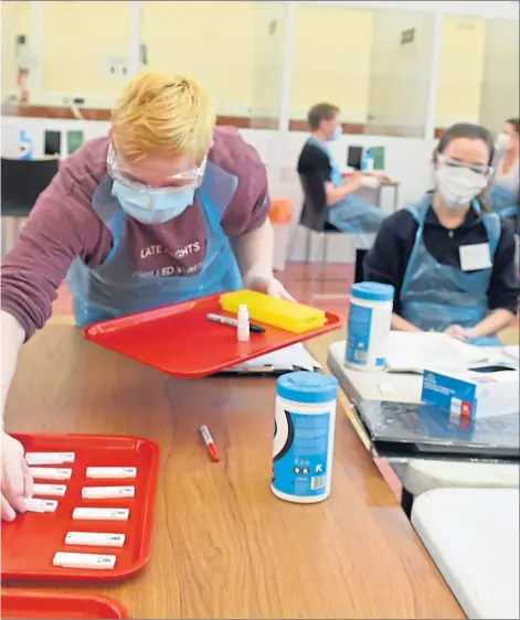  ?? Picture
Paul Glendell ?? Students are tested for Covid-19 at the Butchart Building, Aberdeen University, left, and, above, how we revealed delay fears at testing hub