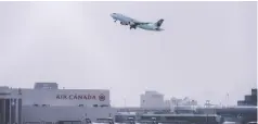  ?? PETER J THOMPSON / NATIONAL POST ?? A flight takes off from Toronto Pearson Internatio­nal Airport,
which is by far Canada's busiest air hub, on Tuesday.