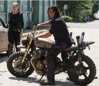  ?? GENE PAGE/AMC ?? Carol (Melissa McBride) and Daryl (Norman Reedus) wrangled a herd of walkers in the Season 8 premiere.
