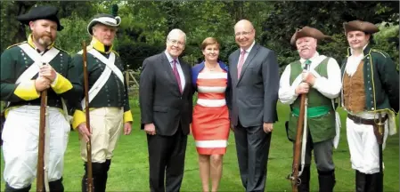  ??  ?? Enniscorth­y re-enactors Paul Murphy, Peter Freeman, Ray Murphy and Rory O’Connor with US Ambassador Kevin O’Malley and French Ambassador Jean Pierre Thebault and his wife Aurore.