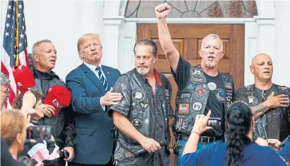  ?? CAROLYN KASTER/THE ASSOCIATED PRESS ?? U.S. President Donald Trump spent part of Saturday with Bikers for Trump, at his self-branded golf club in Bedministe­r, N.J.