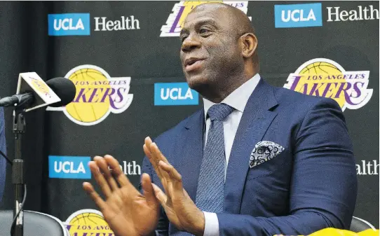  ?? DAMIAN DOVARGANES/THE ASSOCIATED PRESS ?? Los Angeles Lakers owner Jeanie Buss is counting on president of basketball operations Magic Johnson, pictured, to work some magic and help get the legendary NBA team back to its glory days. The Lakers could be in the mix to recruit LeBron James, as...