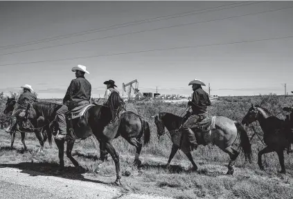  ?? Adriana Zehbrauska­s / New York Times ?? A frenetic oil boom in New Mexico's “Little Texas” is revealing a sharp divide between the oil producers and Santa Fe.