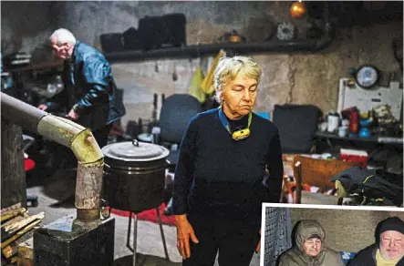  ?? ?? Flare-ups have become routine for Oleksandr and Luidmila after 10 months in the cramped basement of their apartment block in Siversk. — Photos: AFP