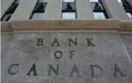  ?? THE CANADIAN PRESS FILE PHOTO ?? The central bank held firm on interest rates as the economy copes with low oil prices and the impact of wildfires in Alberta.