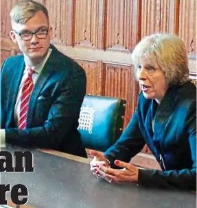  ??  ?? Hosting a student event: Jan Nedvidek with Theresa May