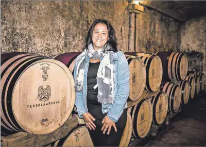  ??  ?? Against all odds: Berene Sauls (above) initially struggled to discern the flavours in wine but has developed a fine palate. With the help of winemaker Hamilton Russell, she started her own label, Tesselaars­dal (bottom) and produces wines with grapes sourced from other vineyards.