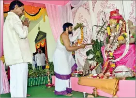  ?? IANS ?? Telangana Chief Minister K. Chandrasek­har Rao offers prayers to Lord Ganesha on the occasion of Ganesh Chaturthi, in Hyderabad on Thursday.