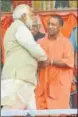  ?? HT FILE ?? Yogi Adityanath with PM Narendra Modi