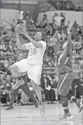  ?? Louisiana Tech Sports Informatio­n ?? Big game: Louisiana Tech's Alexus Malone goes up for a shot during a game against LSU earlier this season. Malone will lead Louisiana Tech into tonight’s Conference USA showdown at Southern Miss. The two teams are tied for third place in the league...