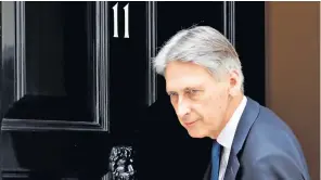  ??  ?? Chancellor Philip Hammond is making the most of the absence of Boris Johnson, above, in Australia, and Theresa May, right, in Italy, to steer the UK towards a softer Brexit