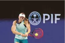  ?? — USA Today Sports ?? Elena Rybakina (KAZ) hits a backhand against Maria Sakkari (GRE) at the Miami Open at Hard Rock Stadium.