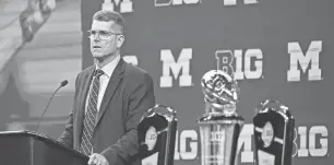  ?? DARRON CUMMINGS/AP ?? Michigan coach Jim Harbaugh was paid $8.1 million in 2022, and his team won 13 games.